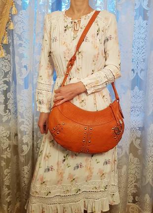 Роскошная кожаная сумка coccinelle красивого апельсинового цвета2 фото