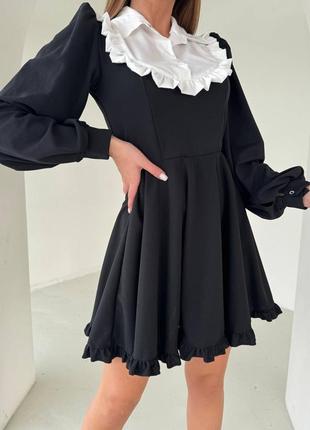 Жіноча сукня чорного кольору7 фото