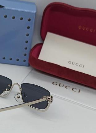 Очки в стиле gucci женские солнцезащитные модные узкие черные в серебристой металлической оправе9 фото