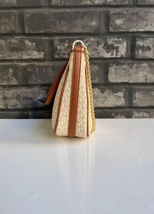 Стильна невероятно красивая и качественная сумочка -michael kors3 фото