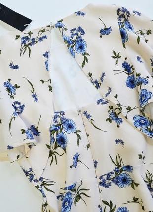 Роскошное пастельное платье миди в нежные цветы5 фото
