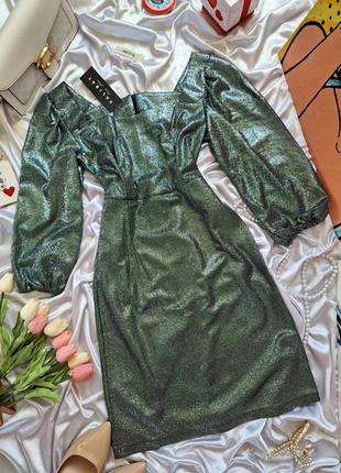Блестящее мини платье изумрудного зеленого цвета с серебряным напылением5 фото