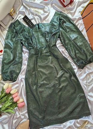 Блестящее мини платье изумрудного зеленого цвета с серебряным напылением7 фото