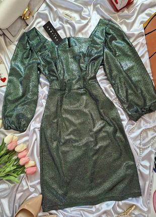 Блестящее мини платье изумрудного зеленого цвета с серебряным напылением2 фото