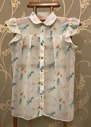 Очень красивая и стильная брендовая блузка в стрекозах.1 фото