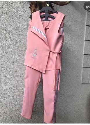 Костюм рожевий 134 см