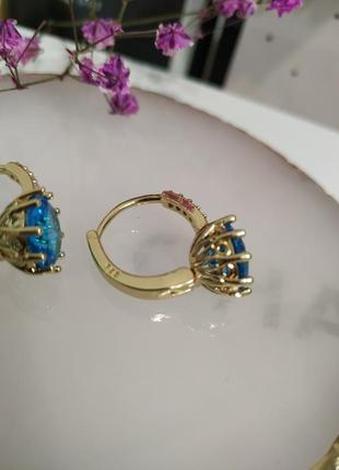 Позолочені сережки золотисті блакитні циркони фіаніт кульчики покриття золото 18к5 фото