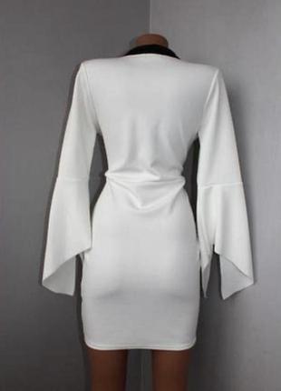 Прдарок! стильное черно белое платье-пиджак с глубоким декольте и с рукавами клешь м4 фото