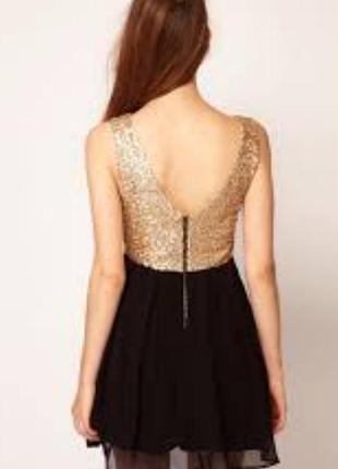 Чудесное платье с золотистыми пайеткпми
