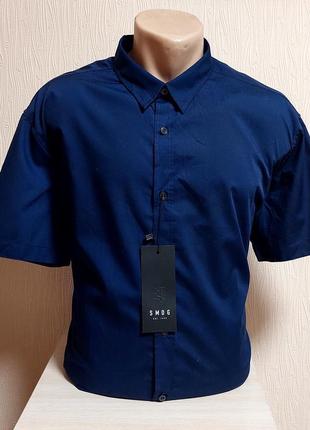 Стильная рубашка синего цвета с короткими рукавами smog made in bangladesh с биркой