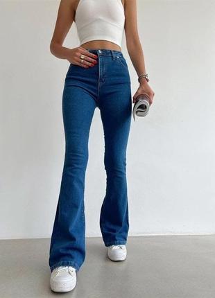 Женские стрейчевые джинсы клеш от колена2 фото