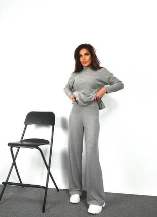 Трендовий якісний жіночий оверсайз костюм гольф і брюки в рубчик однотонний комплект на легкому флісі1 фото