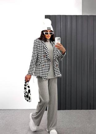 Трендовий якісний жіночий оверсайз костюм гольф і брюки в рубчик однотонний комплект на легкому флісі4 фото