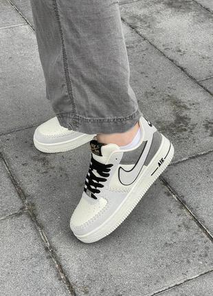 Женские кроссовки nike air force 1 low beige grey7 фото