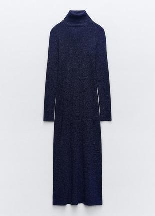 Металізована трикотажна сукня середньої довжини