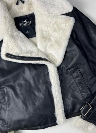 Черная куртка дубленка с белым мехом2 фото