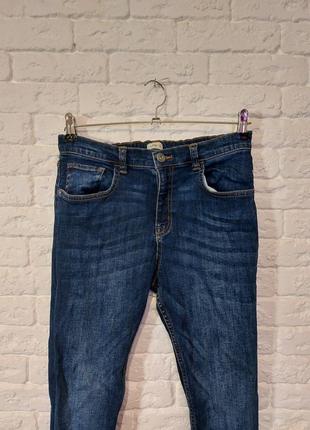 Фирменные стрейчевые джинсы 11-12 лет2 фото