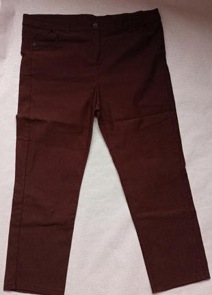 Коричневые стрейчевые джинсы с высокой посадкой1 фото