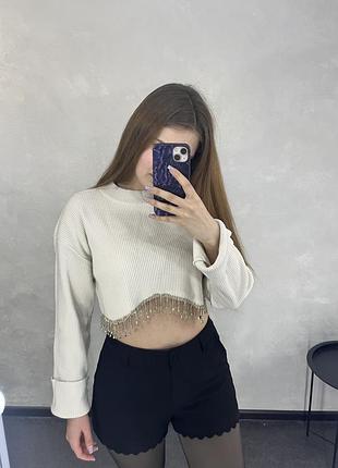 Кофтинка з блискучими камінцями