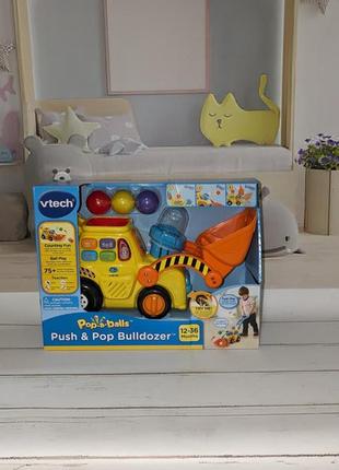 Vtech розвиваюча іграшка "pop-a-balls push & pop bulldozer"