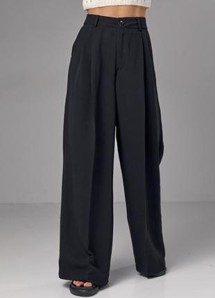 Женские широкие брюки палаццо со стрелками1 фото