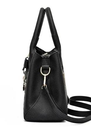Модная женская сумка с брелком каркасная,качественная классическая дамская сумочка из эко-кожи6 фото