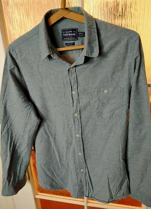 Стильная рубашка от известного бренда.