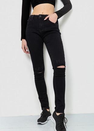 Стильные рваные на коленях джинсы1 фото