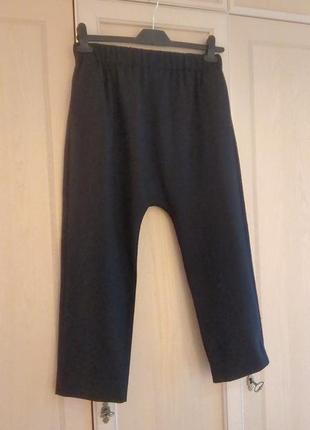 Стильні вовняні брюки із заниженою мотнею та кишенями  від cos.1 фото