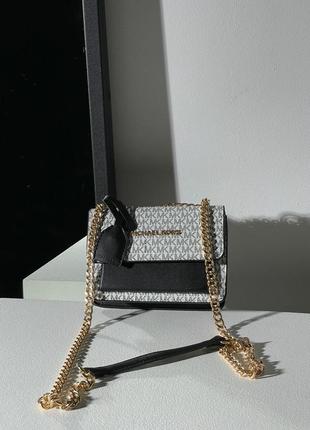 Жіноча сумка в стилі mk sunset mini white люкс якість5 фото