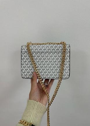 Жіноча сумка в стилі mk sunset mini white люкс якість7 фото