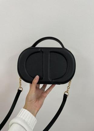 Женская сумка signature oval camera bag black leather