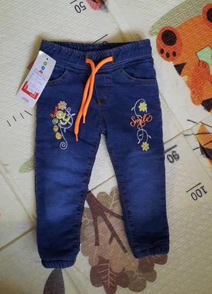 Теплые новые джинсы на девочку