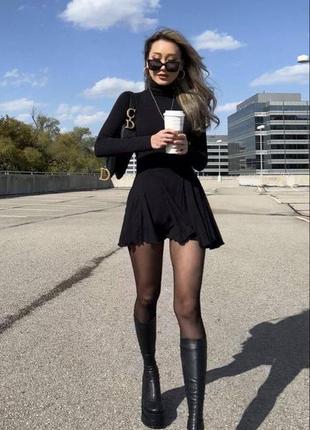 Сукня міді з довгими рукавами високим коміром під горло приталена з рясною спідницею платт...