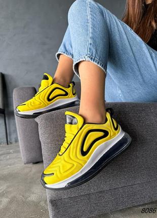 Жовті жіночі кросівки на високій підошві потовщеній