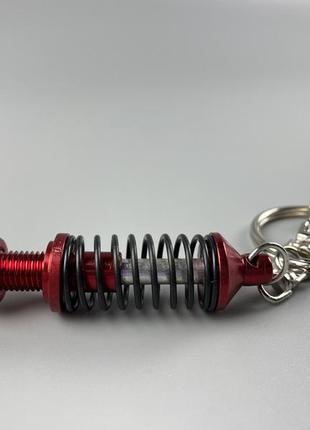 Брелок червоно-сріблястий амортизатор в зборі, авто брелок для автомобільних ключів7 фото