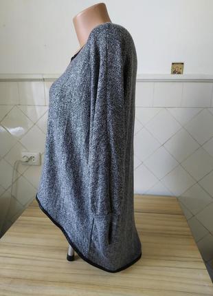 Италия.вискозная блуза с удлиненной спинкой и черной отделкой3 фото