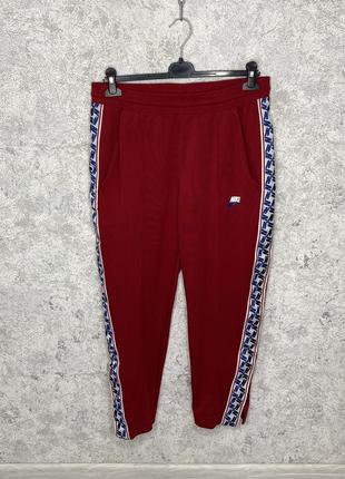 Мужские брюки nike nsw taped poly pants оригинал!2 фото