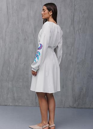 Розкльошене плаття-вишиванка молочне з жар-пташками на рукавах2 фото