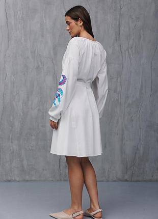 Розкльошене плаття-вишиванка молочне з жар-пташками на рукавах7 фото