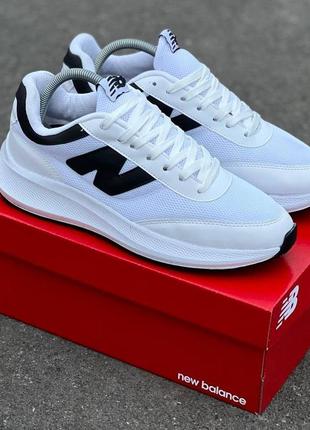 Мужские кроссовки белые с черным в стиле new balance