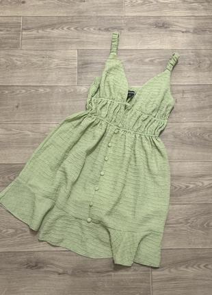 Зеленое нарядное платье ткани под вафельку1 фото