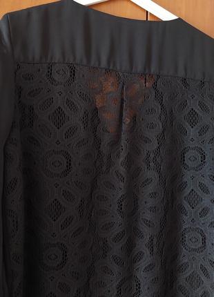 Чорна блузка з прозорою вставкою на спині4 фото