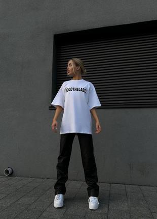 Базовая женская футболка оверсайз с удлиненными рукавами и надписью1 фото