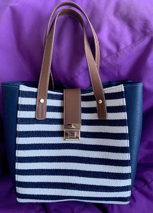 Сумка у смужку з плетеною тканинною вставкою