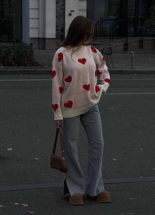 Стильний вʼязаний светр з сердечками8 фото