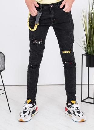 Чоловічі джинси модні молодіжні завужені рвані з латками1 фото