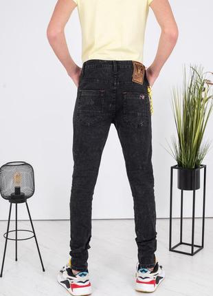 Чоловічі джинси модні молодіжні завужені рвані з латками3 фото