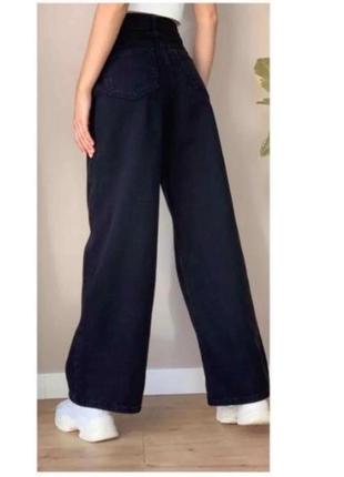 Женские джинсы палаццо с широкими штанинами черного цвета3 фото