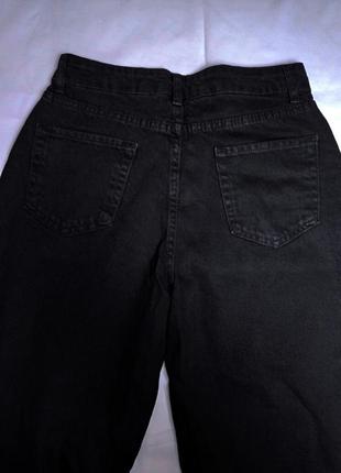 Женские джинсы палаццо с широкими штанинами черного цвета6 фото